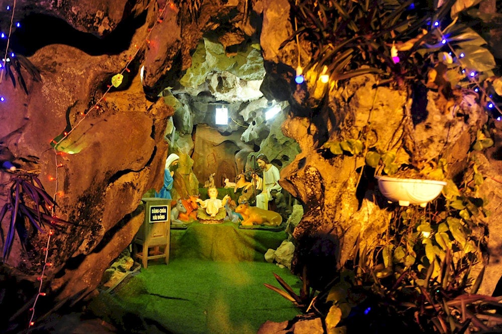 The Nativity Grotto symbolizes the peaceful birth of Jesus, with intricate carvings of the Holy Family